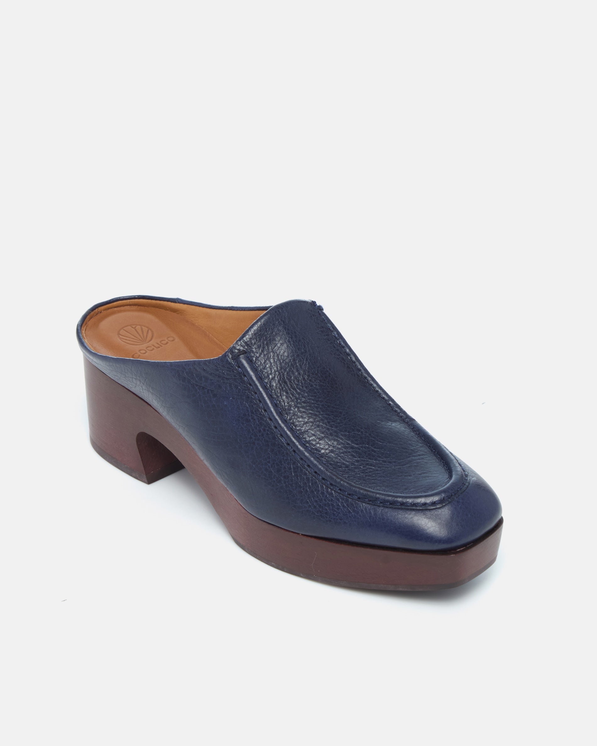 Coclico Qadira Clog in Marino navy leather, angled view of the closed toe and clog base