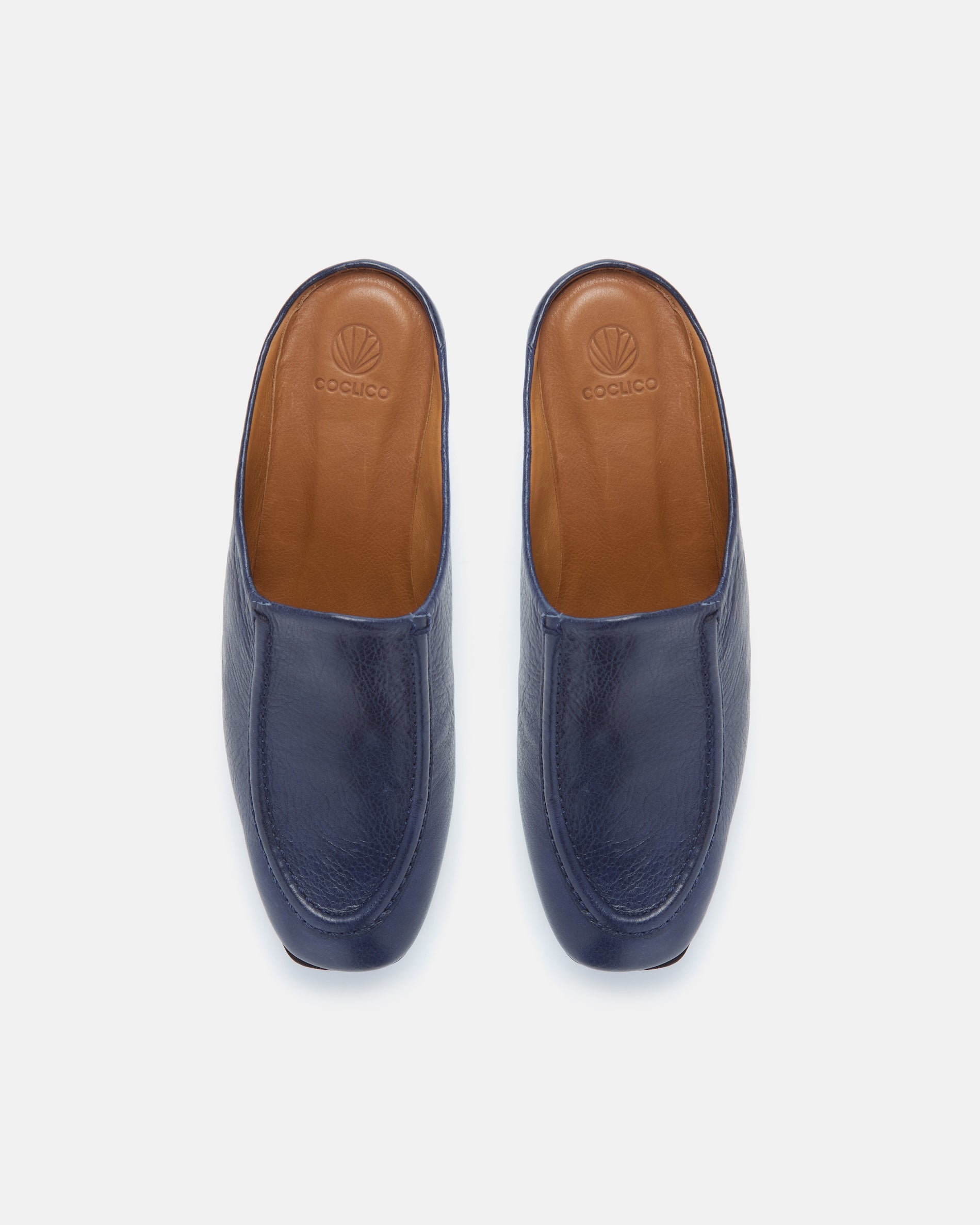 Pair of Coclico Qadira Clogs in Marino navy leather, top view of closed toe clog mules