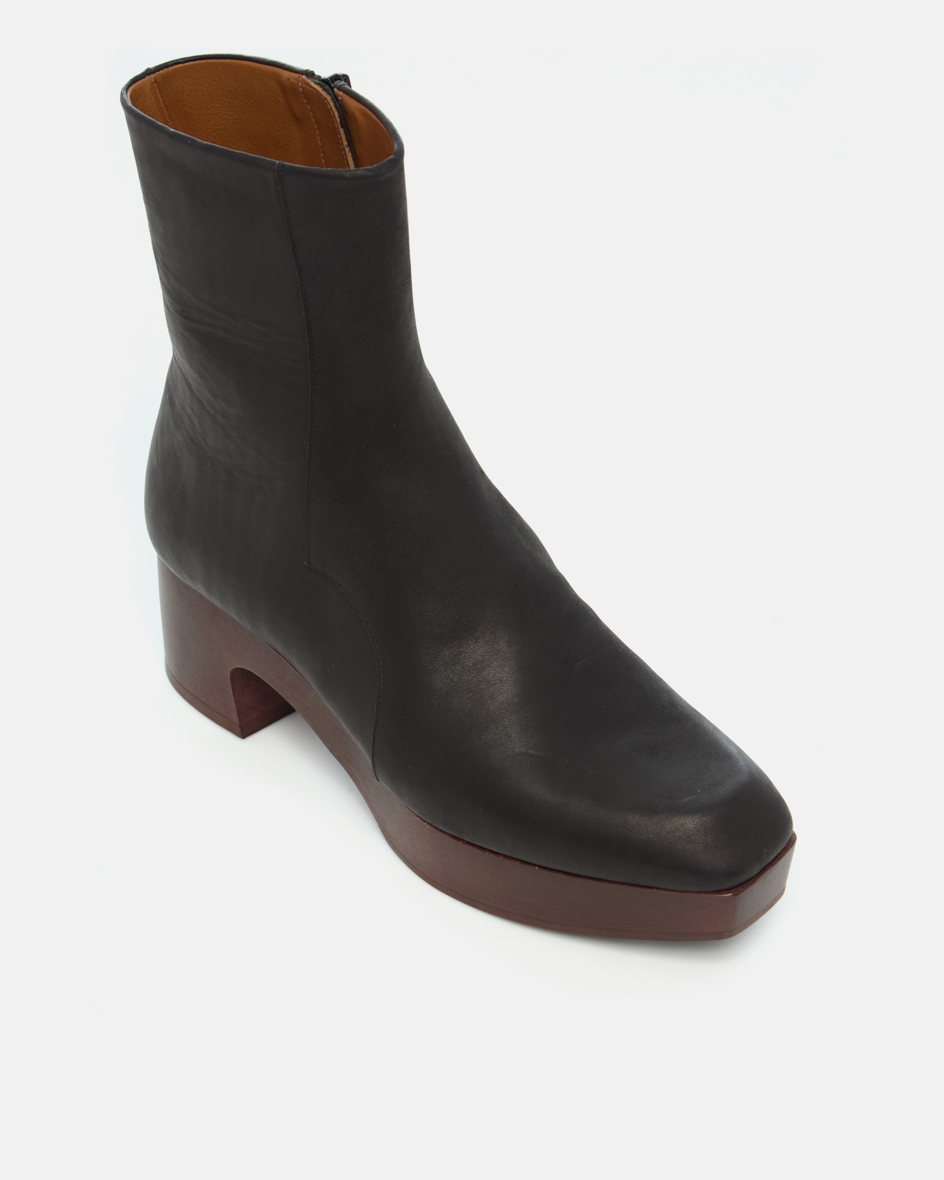 Coclico Quality Clog Boot in black leather, angled view of the square toe and platform sole