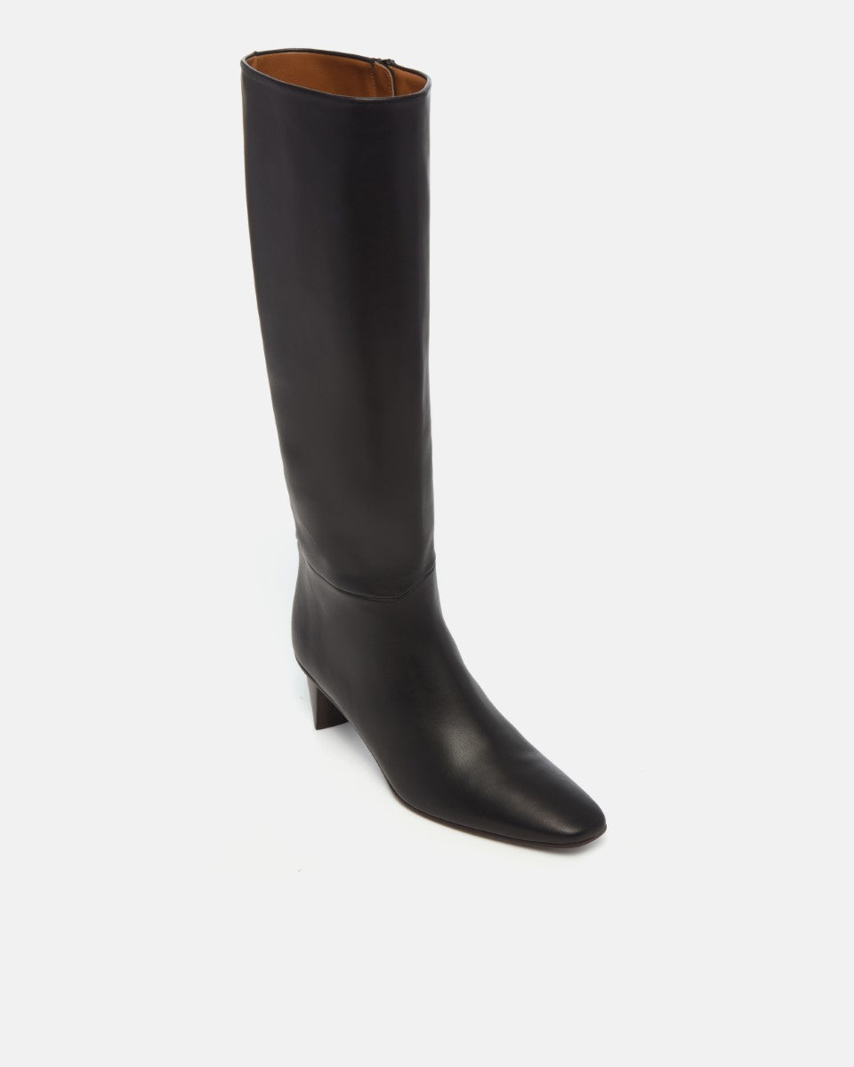 Coclico Sirleaf Boot in black leather, angled view of the pointed toe knee high silhouette