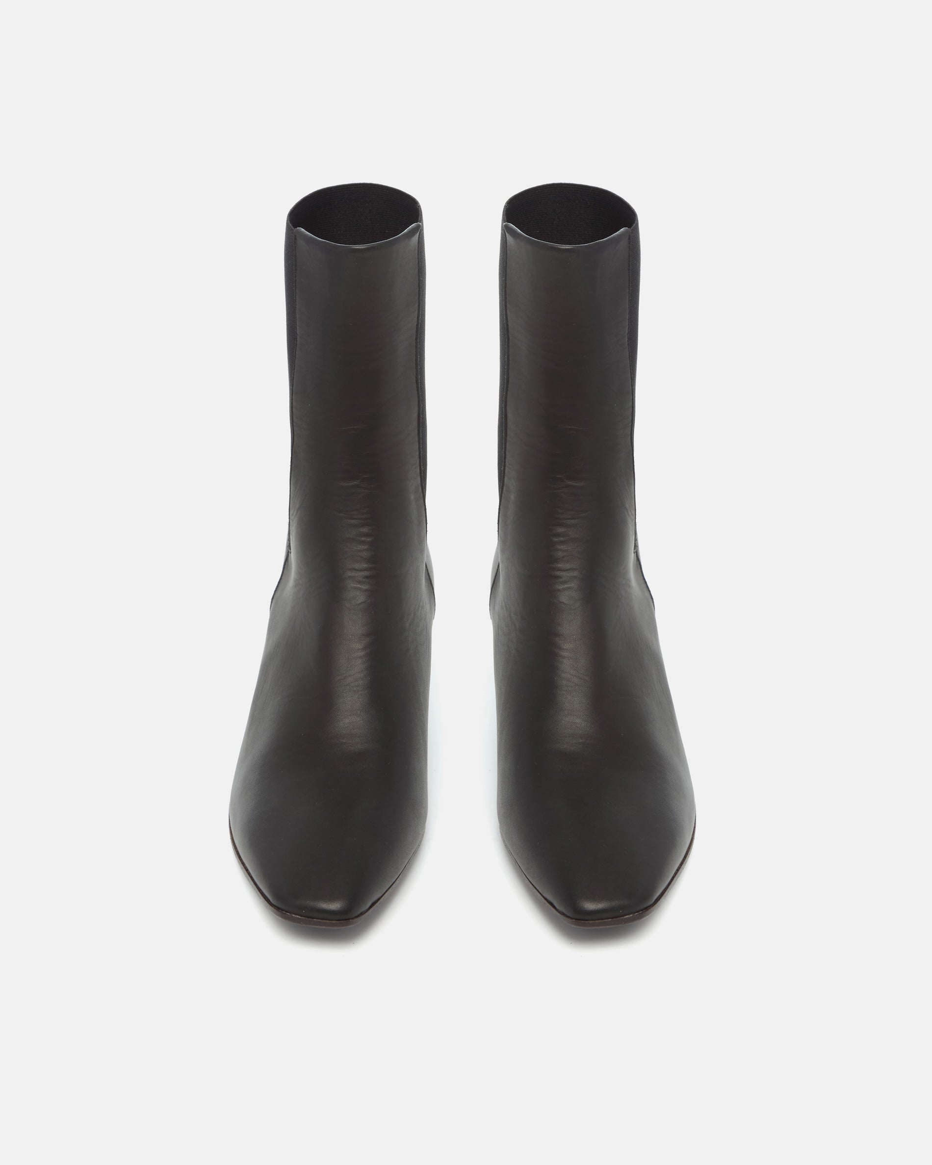 Pair of Coclico Suttner Boots in black leather, front view of mid calf Chelsea boots