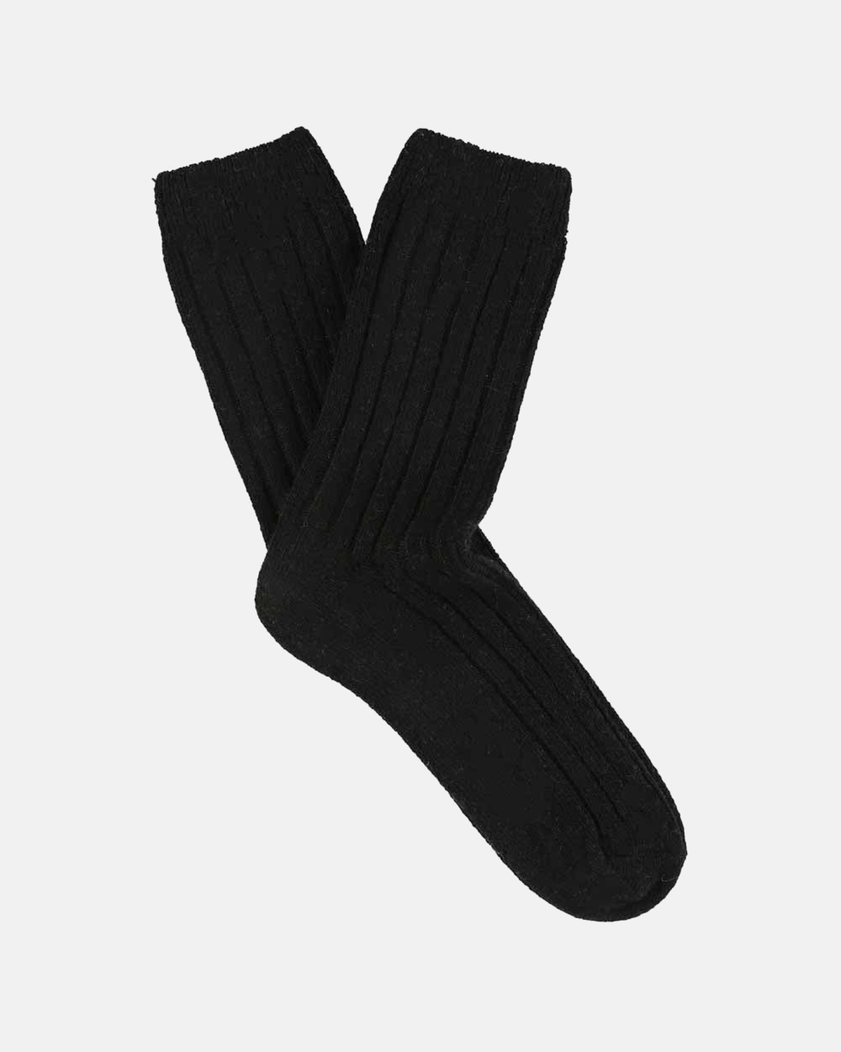 Escuyer women's cashmere crew socks in black on a light grey background