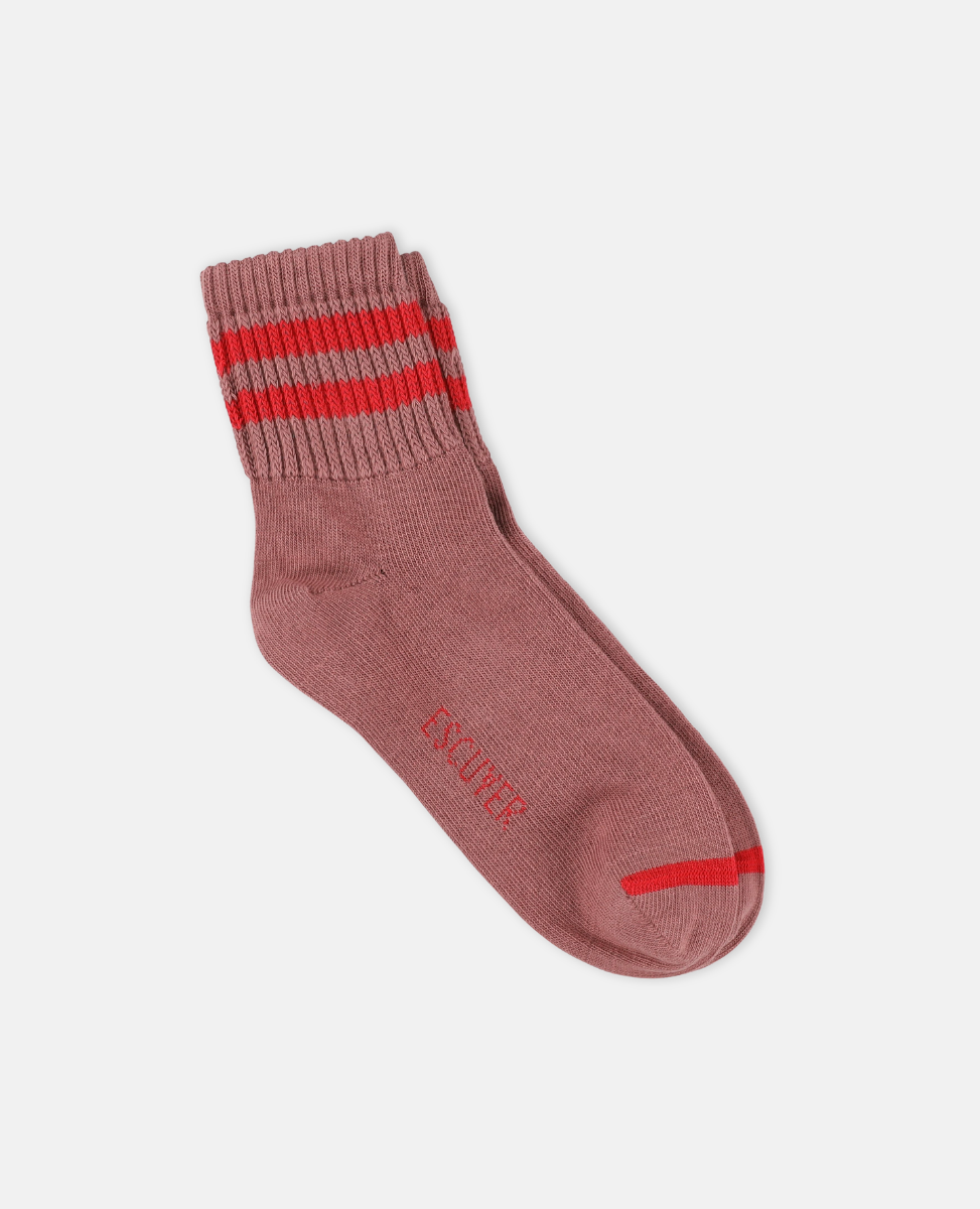 Escuyer Pink sock with red stripes on a white background