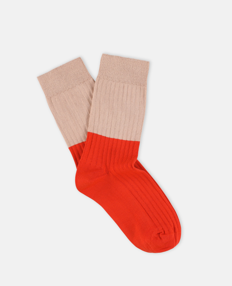 Escuyer pink and red socks on a white background