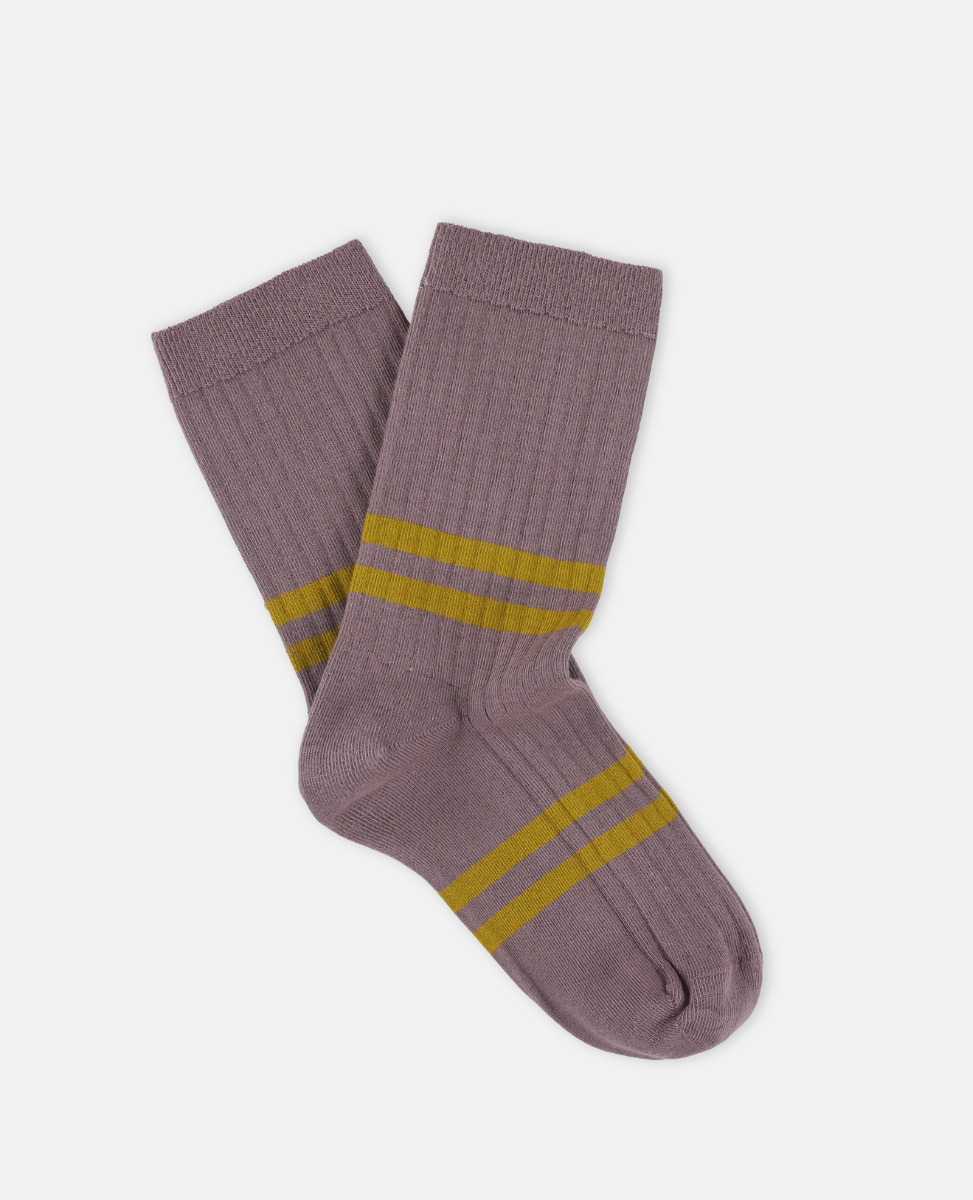 Escuyer Pair of purple socks with yellow stripes on a white background