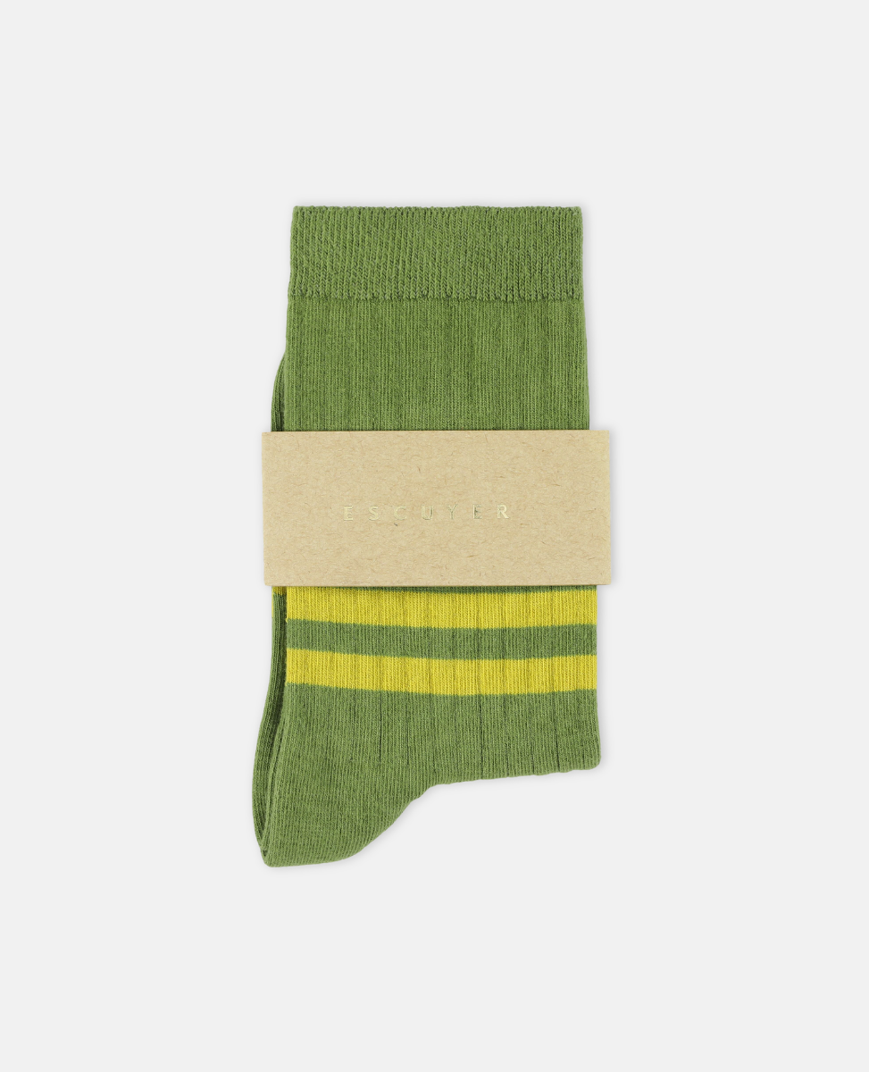 Escuyer Green sock with a beige band on a white background