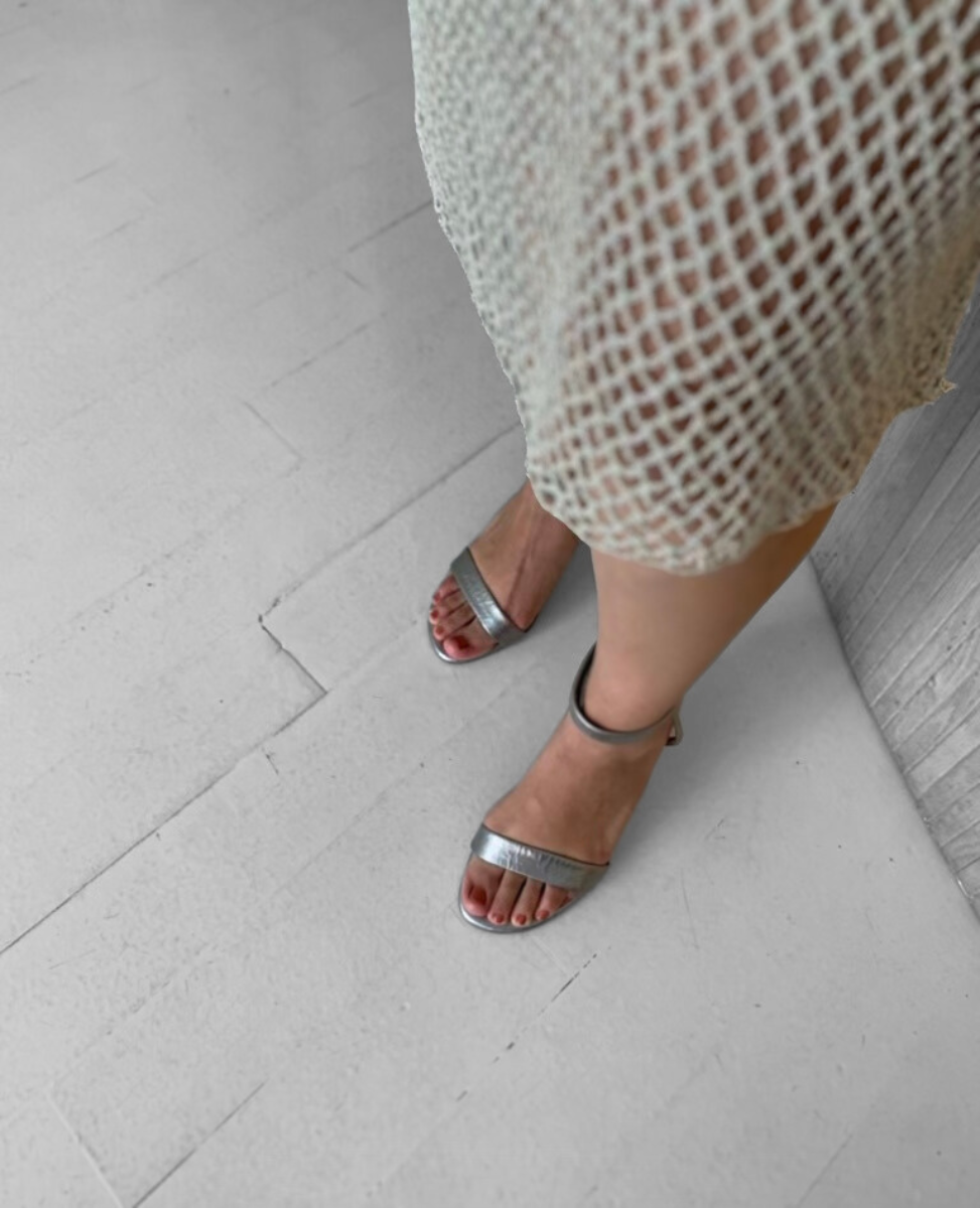 Vew from above of a woman wearing the Gina Heel