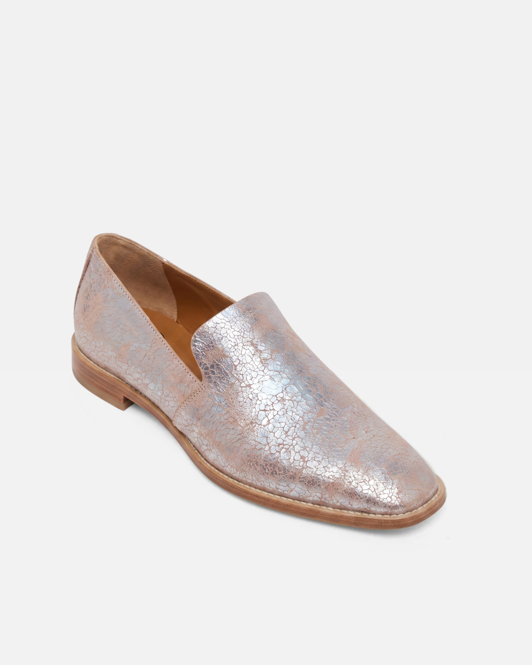 Pink metallic loafer shoe on a white background
