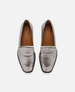 Pair of silver loafers on a white background 1