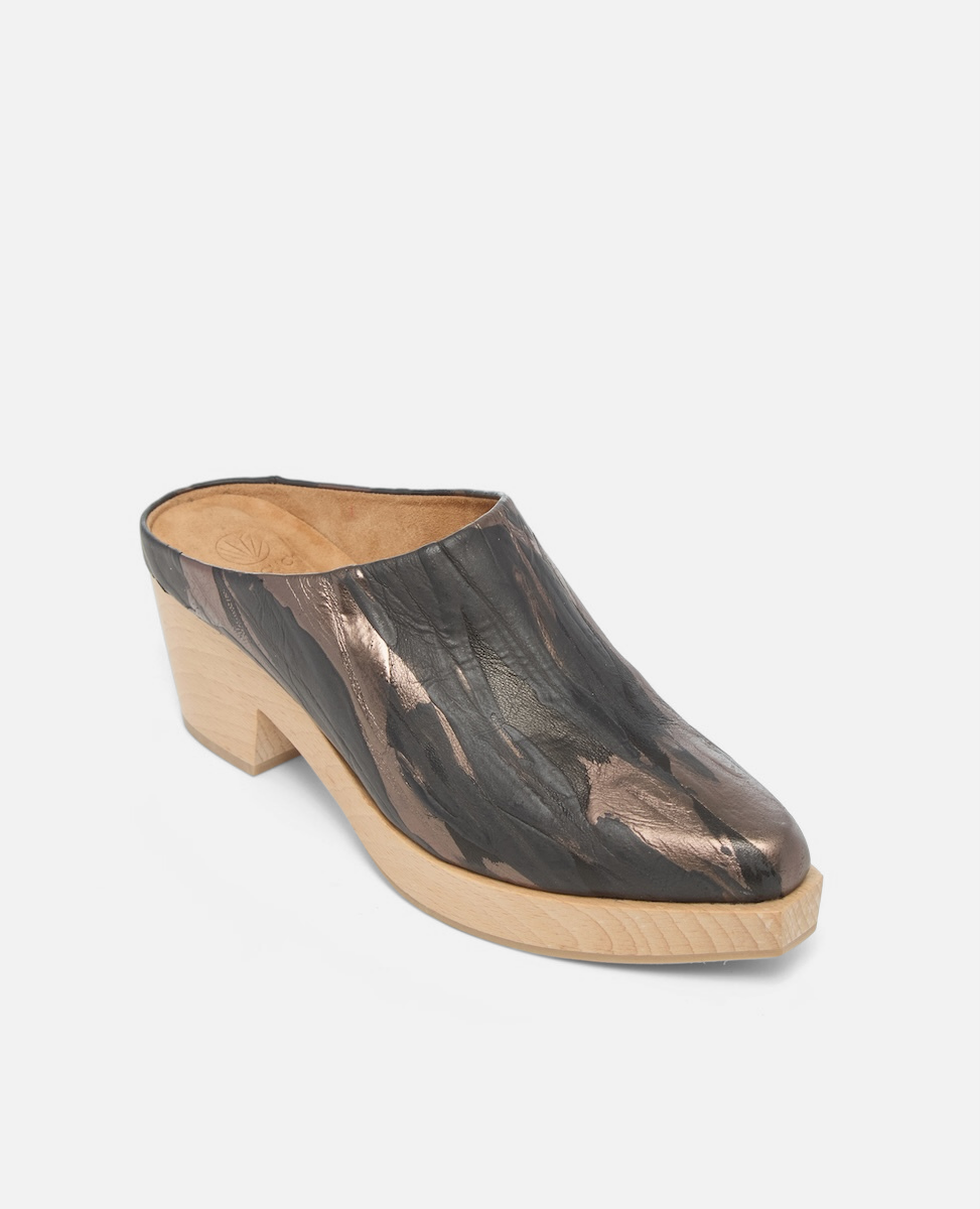 Bronze metallic clog shoe on a white background
