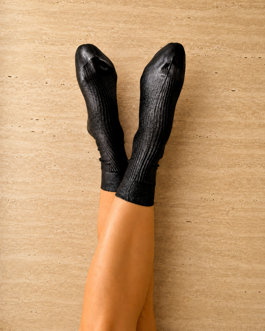 Maria La Rosa Metallic Black socks worn by a person against a light gray background