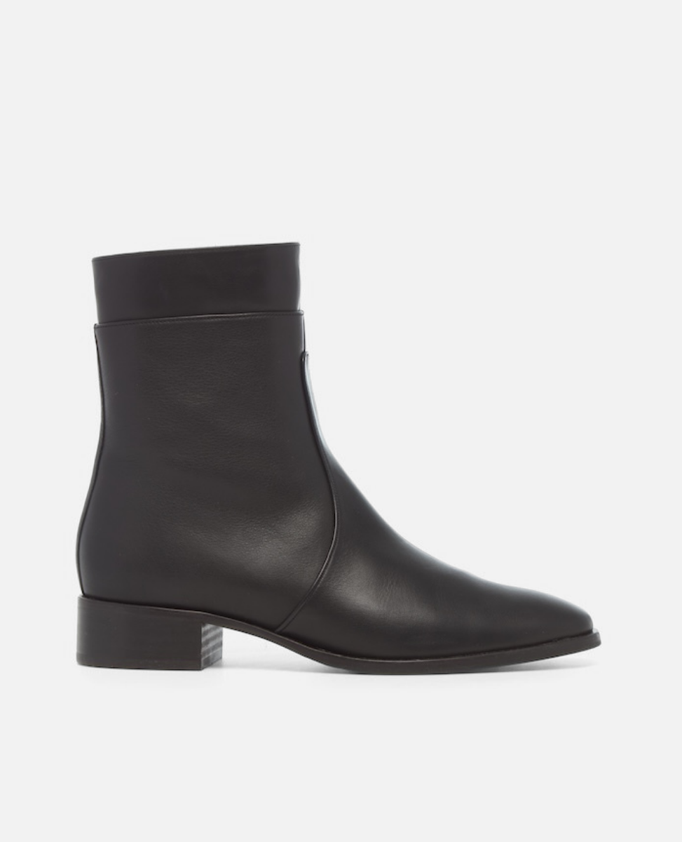 Black ankle boot on a white background