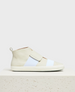 A minimalist, off-white high-top sneaker with a smooth leather texture, featuring a wide, white elastic strap across the front, a pull tab at the heel, and a white rubber sole. 1