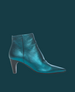 A sleek, metallic teal ankle boot with a pointed toe, mid-height block heel, and smooth, glossy leather finish. 3