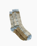 A pair of beige and light blue socks featuring a textured, rectangular pattern with a ribbed cuff and smooth toe and heel sections. 2