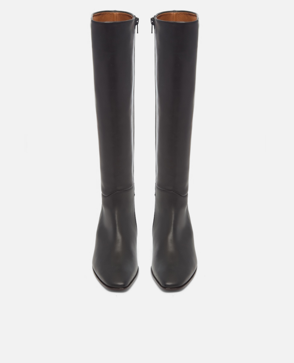 Pair of black knee-high boots on a white background