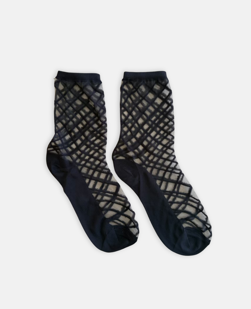 Black fishnet socks on a white background