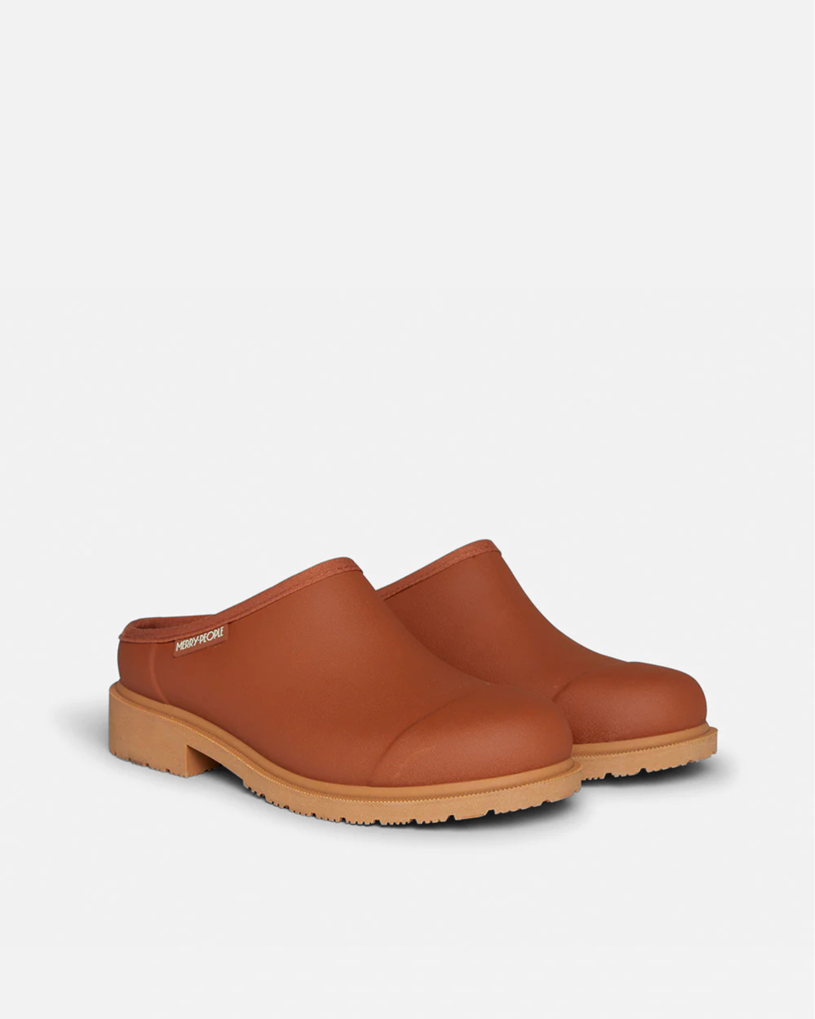 Rust color  neoprene slide with light brown rubber sole against light grey background