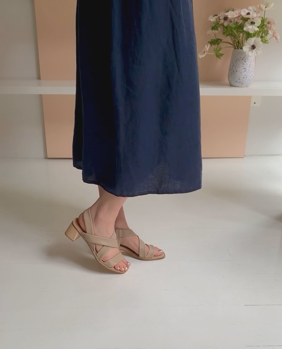 Woman walking in the Jade Heel to show movement and fit.