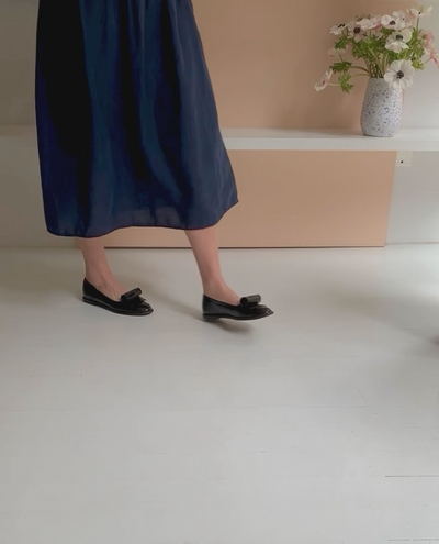 Woman walking in the Yale Loafer to show movement and fit.