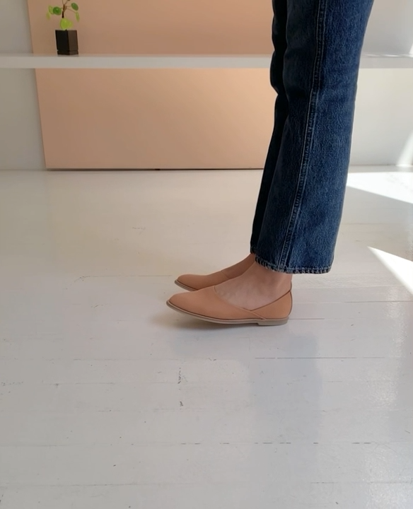 Woman walking in the Yen flat in Faun