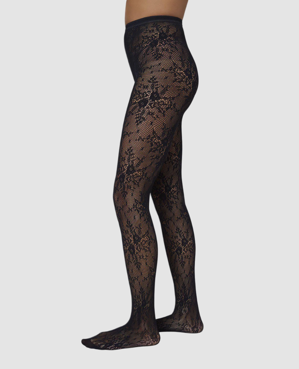 Black lace tights on a white background