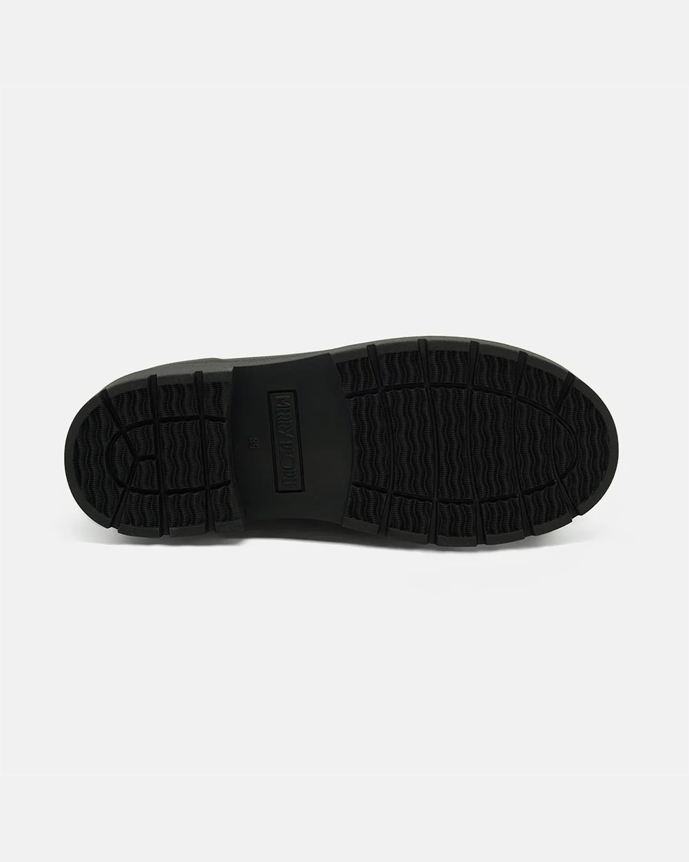 Treaded black rubber platform sole of the Tully rain boot