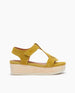 Side view of Coclico Ally Clog in Certosa suede: an open t-strap sandal on solid wood wedge platform with velcro closure. 1
