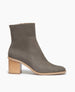 Side view of the Coclico Babe Boot in Fog nubuck : mid-height wood block heel, round toe, inside zip closure.  1