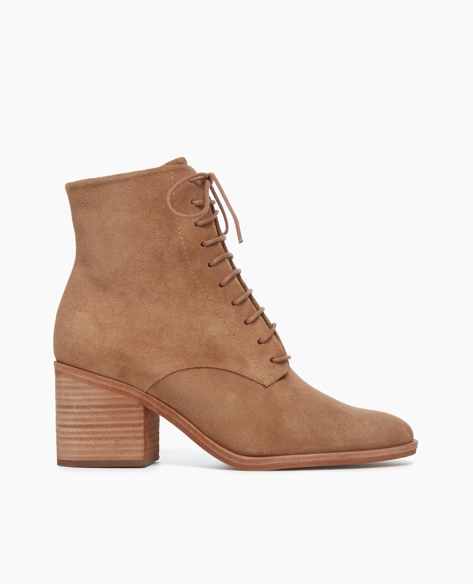 Side view of Coclico Bani Boot in Tobacco suede: lace-up bootie with a natural stacked leather heel and inside zip.