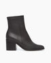 Side view of Coclico Befo Boot in Deep Sea leather: a black leather stack, block wood heel with a rounded toe box.  1