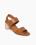 Coclico Birch Heel in Cuoio leather, angled view: two straps across foot, elasticated back strap, wood block mid-height heel. 2