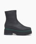 Coclico Charme Boot in Black leather: inside zip closure, angular toe, modest green platform that connects mid-height black water-resistant treated EVA soles to leather body - side view.  1