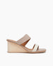 Side view of Coclico Doe Wedge in Greige & Marmo leather: Two-toned slide, asymmetric straps, solid wood mid-height wedge. 1