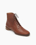 Angle view: Coclico Eclair boot in Caramello leather, a laced-up boot with a round heel, patch sole and back-zip closure.  5