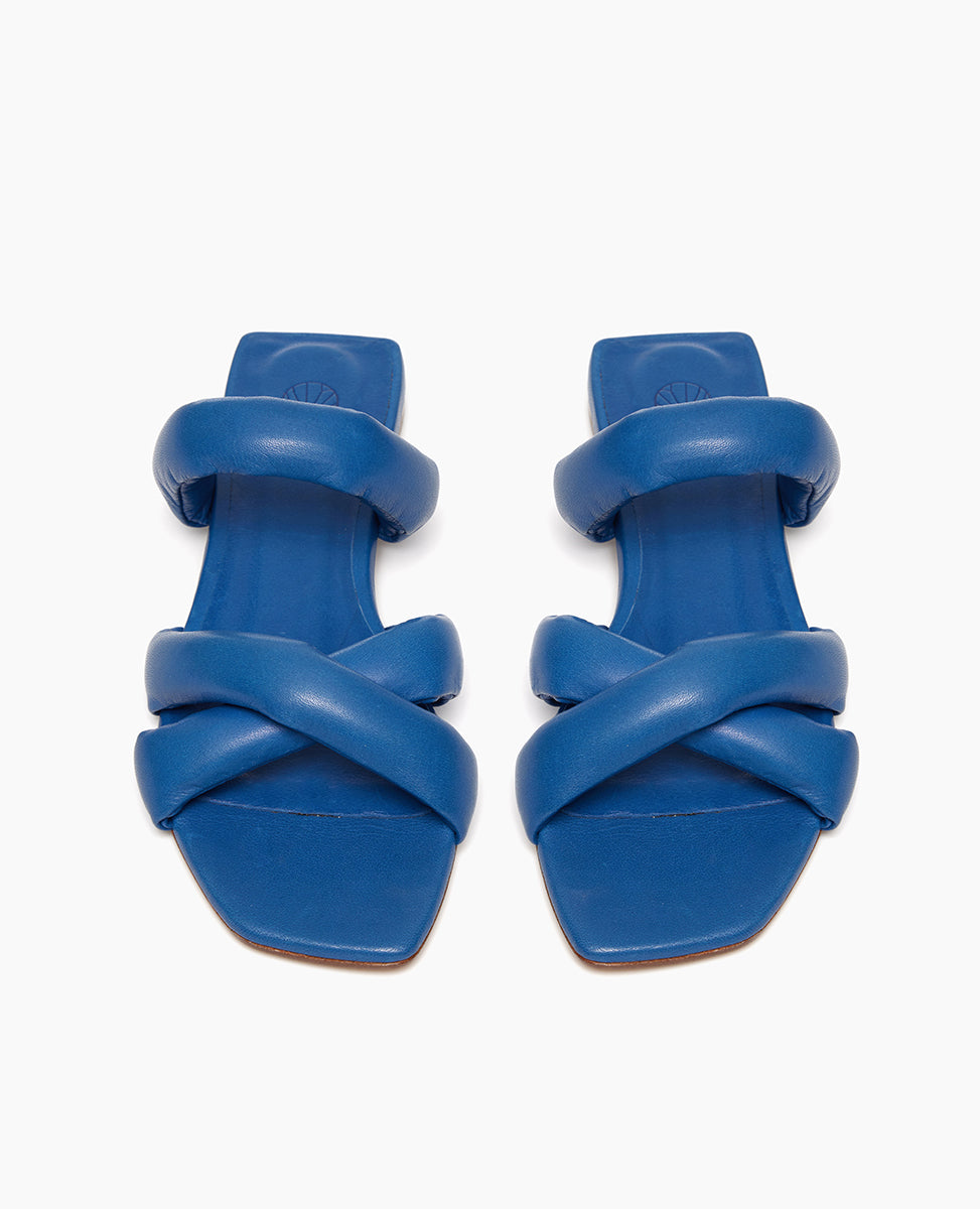 Top view of Coclico Fanima Sandal in Blu Estate leather: a slide with tubular padded straps, squared-off toe and heel, flat feel.
