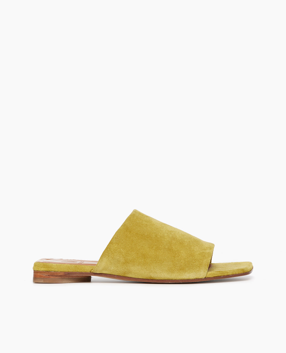 Side view of Coclico Ferhana Sandal in Certosa suede: flat slide-on style with one solid band of leather, squared-off at the toe and heel.