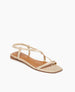 Coclico Frond Sandal in Champagne Shimmer suede: Open sandal with narrow asymmetric straps across foot, back strap, squared-off at the toe and heel. 2