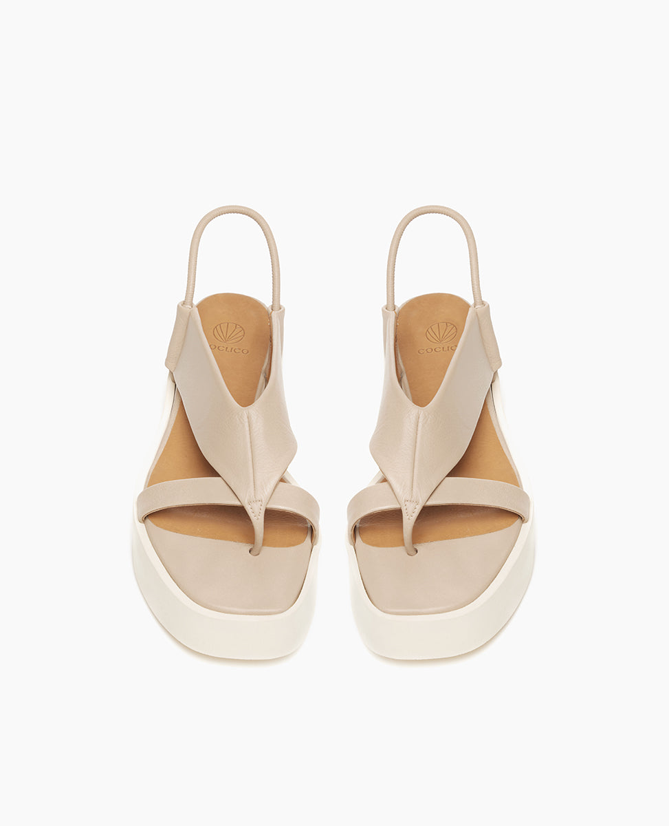 Top view: Coclico Iryna Wedge in Grey Mist leather: V-shaped thong wedge with a slim, tubular elasticated slingback strap, EVA flatform sole.
