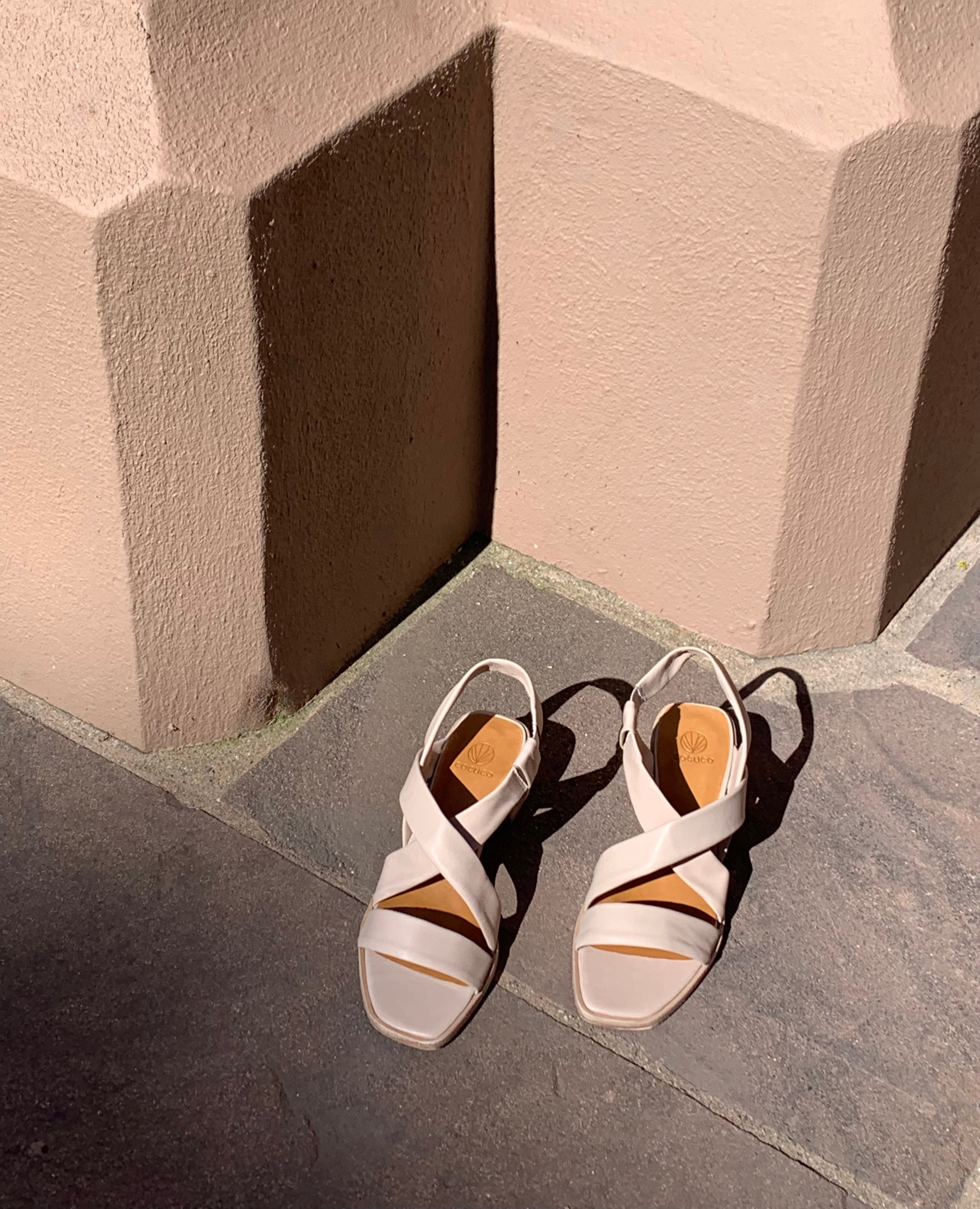 Top view of Coclico Jade Heel in Grey Mist leather: an open slip on sandal with sling-back strap, leather tube straps across the foot, wood block mid-height heel.