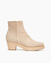 Kabuki Clog in Latte nubuck, side view: Coclico clog with tapered, snipped toe, mid-height wood block platform.   1