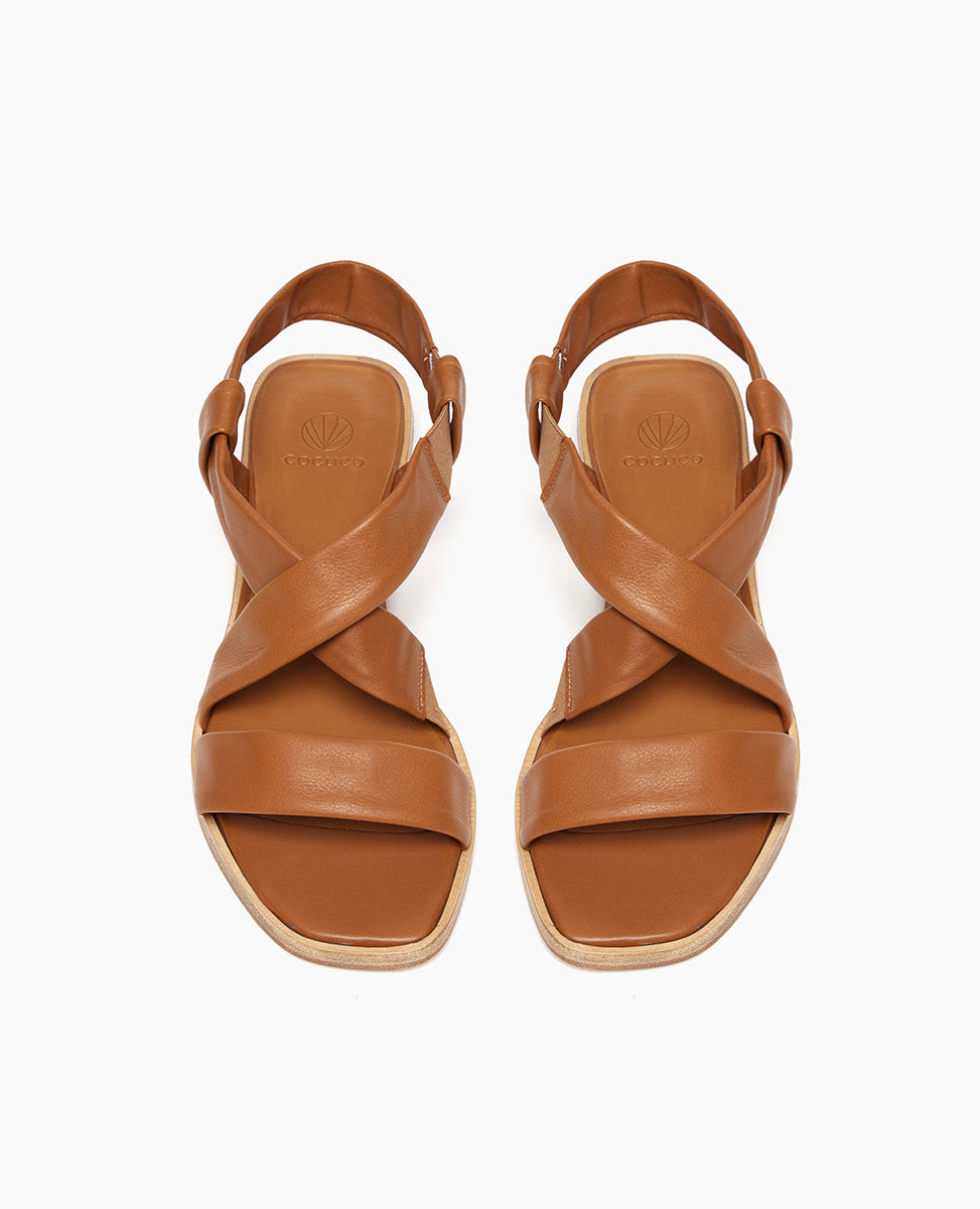 Top view of Coclico Kestyn Sandal in cuoio leather: open sandal with tubular straps across foot and ankle, wide wood low-heel. 