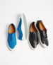 The Klara Sneaker in two colors showing the teal color undersole. 5
