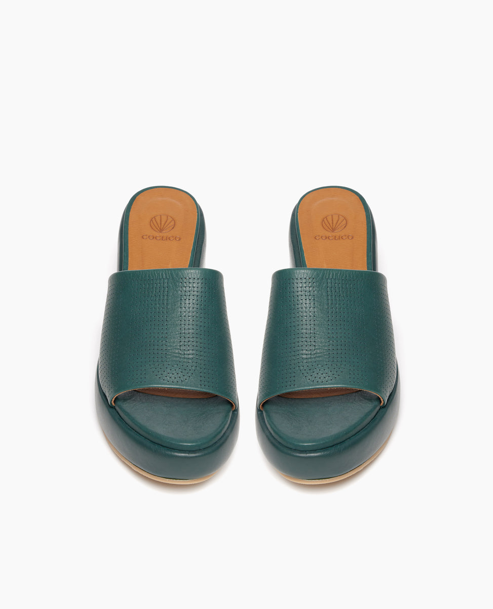 Top view: Coclico Laleh Wedge in Riviera Green leather perfed, slide-on cork wedge covered in padded leather with pinhole strap across foot.