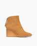 Side view : Coclico Lovage Boot in Wheat suede, a sculpted 75mm solid wood wedge with a rounded toe and a back zip closure.  1