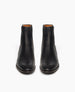 Coclico Medlar Boot in Black. Front view featuring wool elastic gore in a deep forest green, adding an elegant dash of color. 5