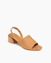 Coclico Okolo Sandal in Mandorla leather: a slingback sandal with a wide stretch leather band across the foot and a softly curved, low, solid walnut wood heel - angle view.   2