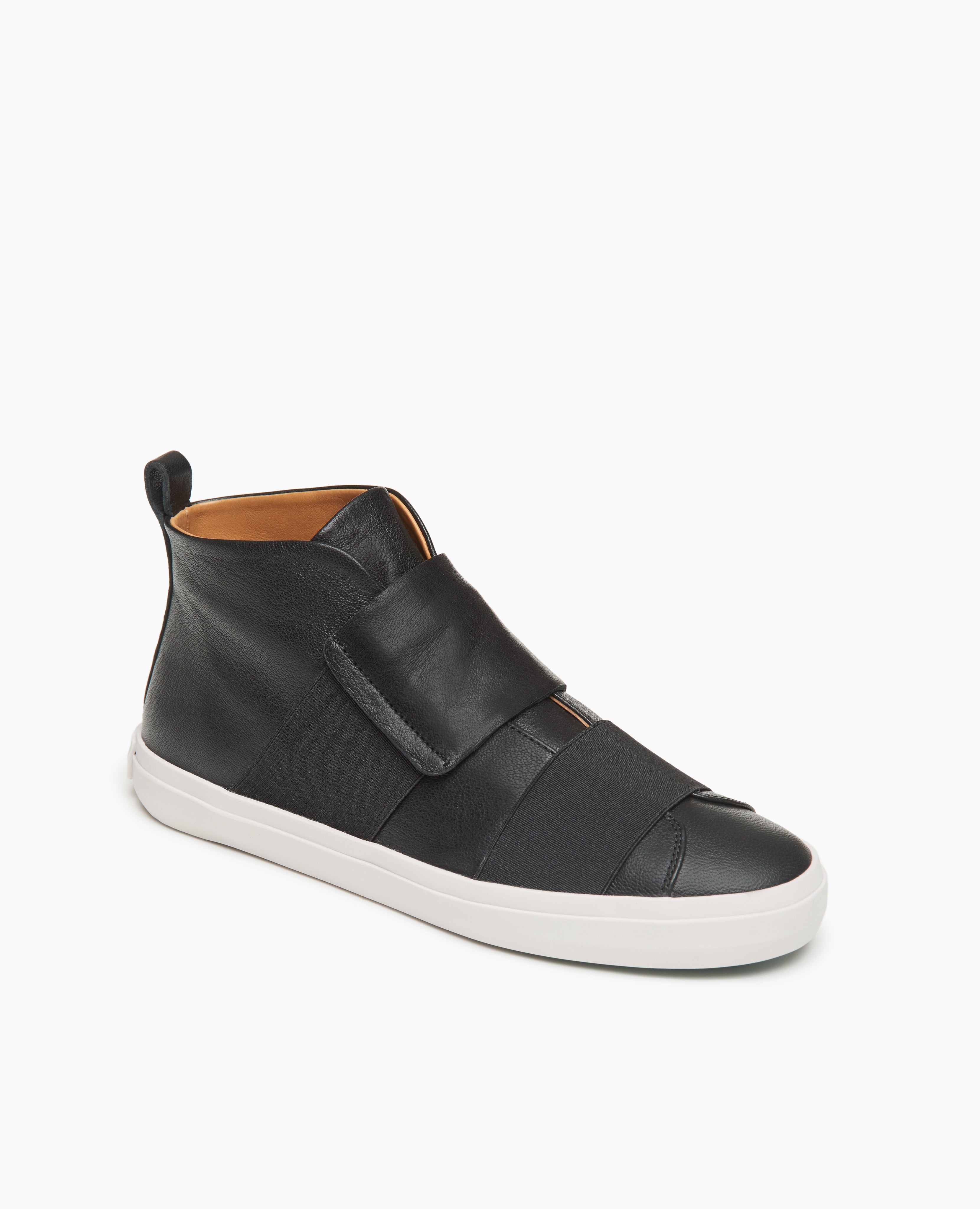 Angled view of the Coclico Opa High-Top Sneaker in Black:  featuring an almond toe shape, elasticated bands in supple, buttery leathers and vegetable tanned linings and covered footbed.