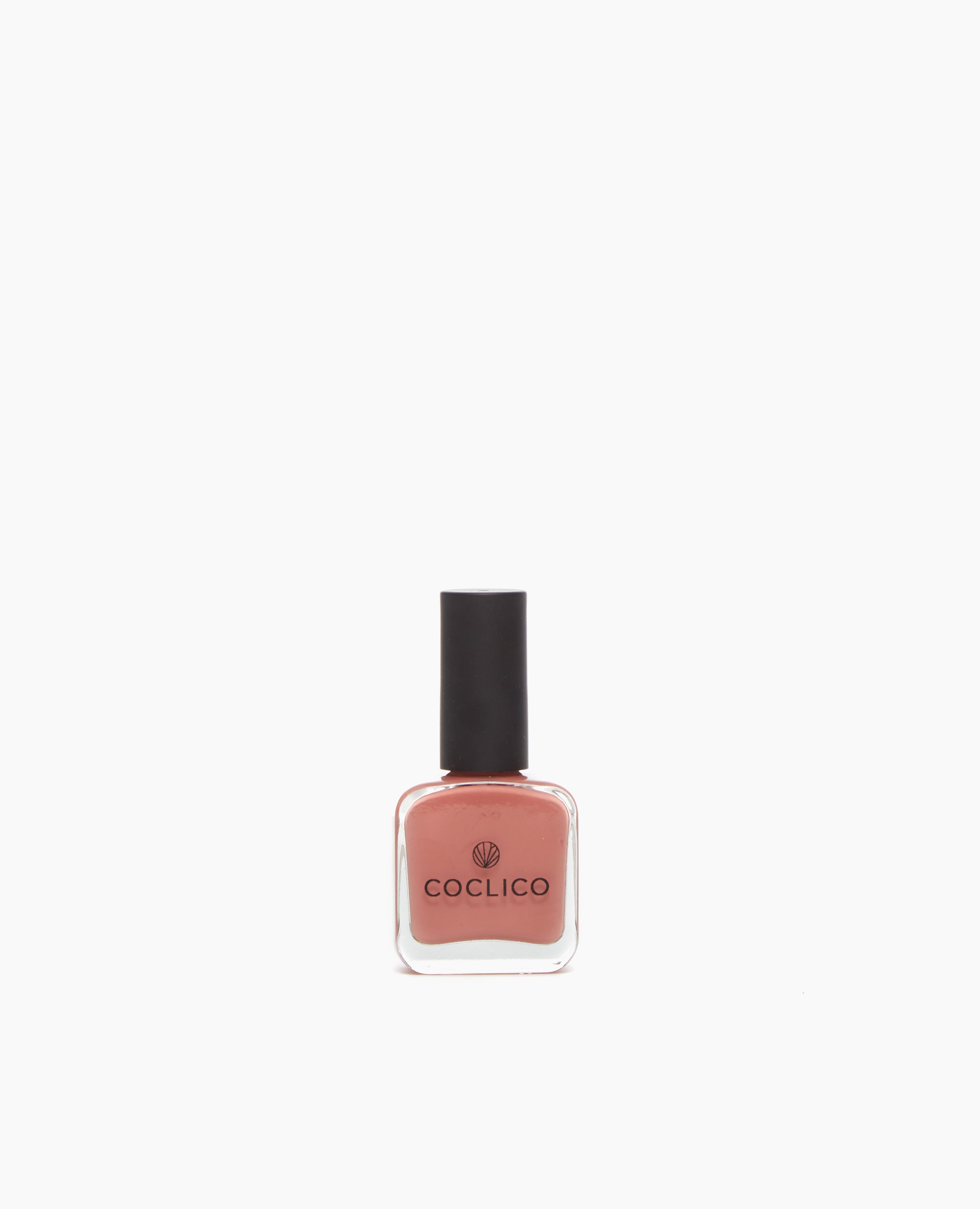 Coclico Nail Varnish in Warmer - Series 2: a delicate pale orange-meets-pink, reminiscent of the warm hues of sun-baked clay.