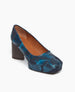 Coclico Trinity Pump in Painter's Blue split suede ; angled view featuring a classic pump silhouette with a artfully formed squared  and a leather covered wood platform. 3